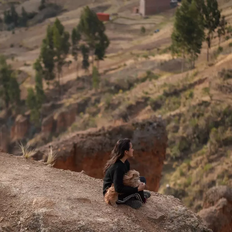 Woman hiking with dog