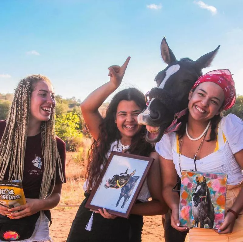 Girls Posing with Horse and Horse Paintings