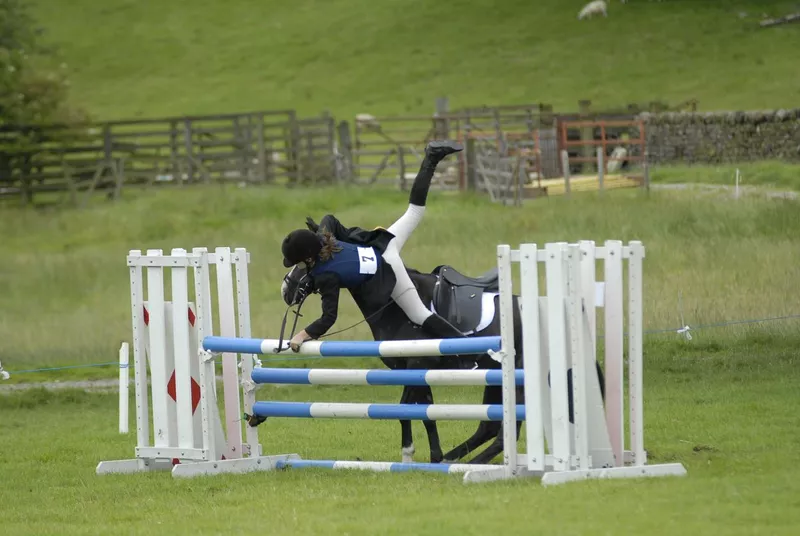 Rider falling from horse