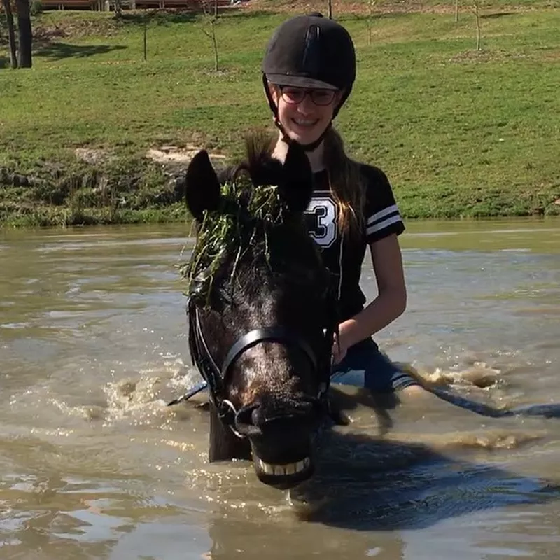 Girl Riding Horse in Water