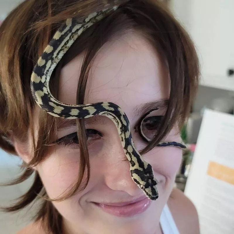 Girl with pet snake