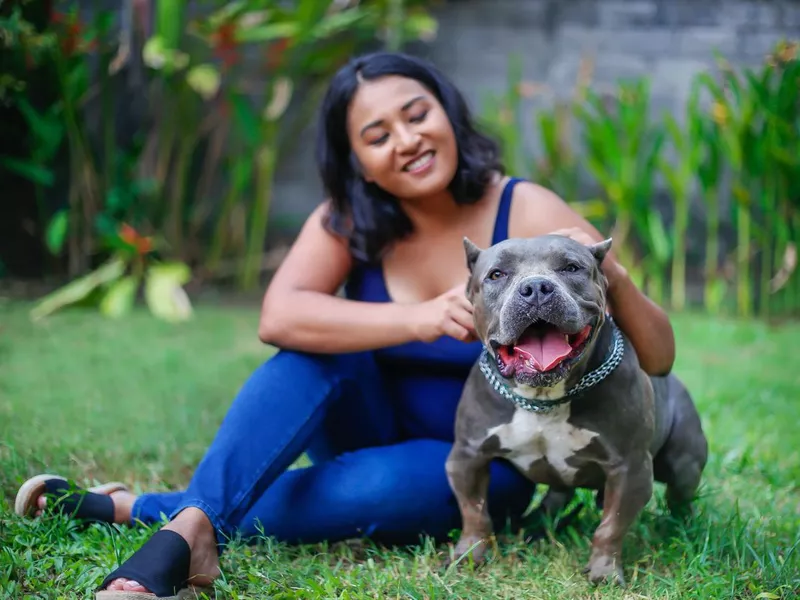 Dog and Owner in Yard